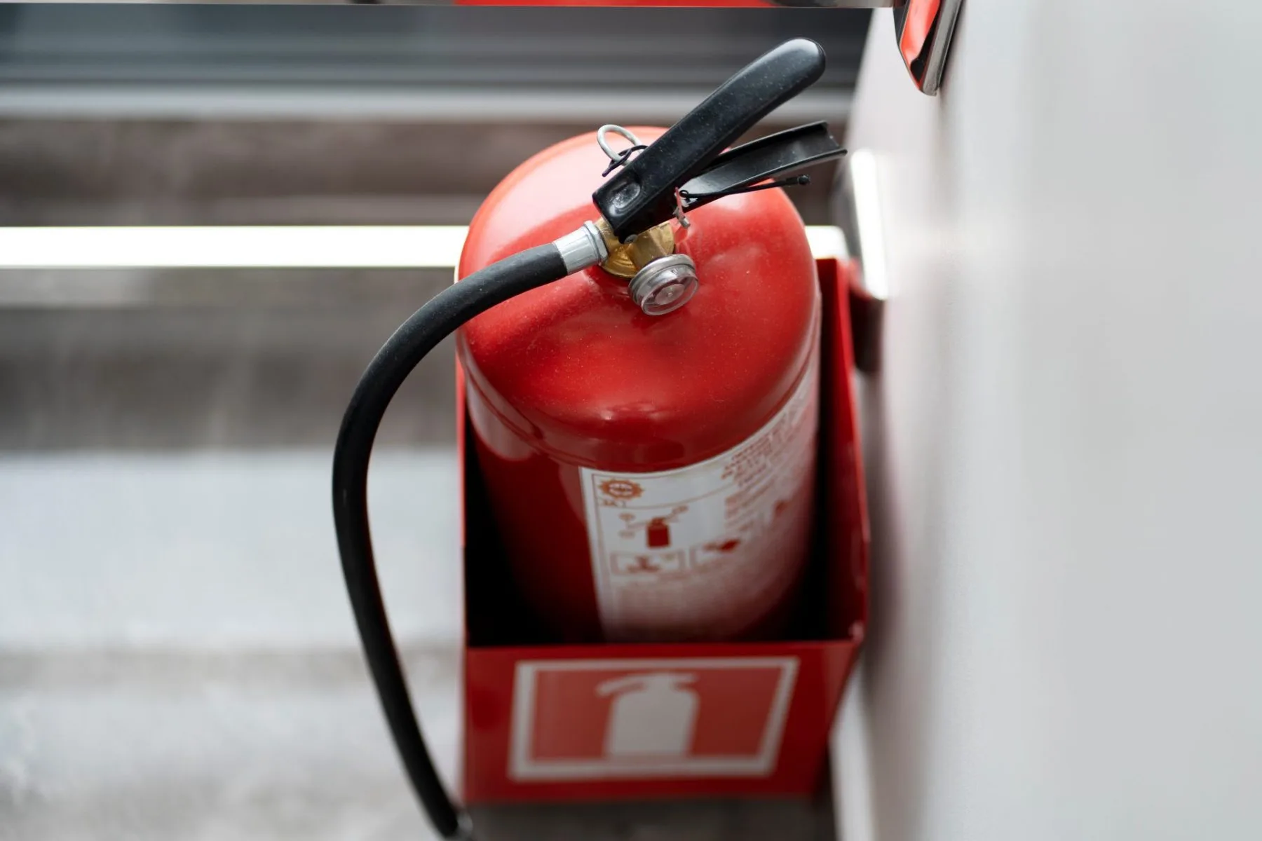 top-view-red-fire-extinguisher-in-room-copy-spac-2024-10-18-08-26-33-utc (1)